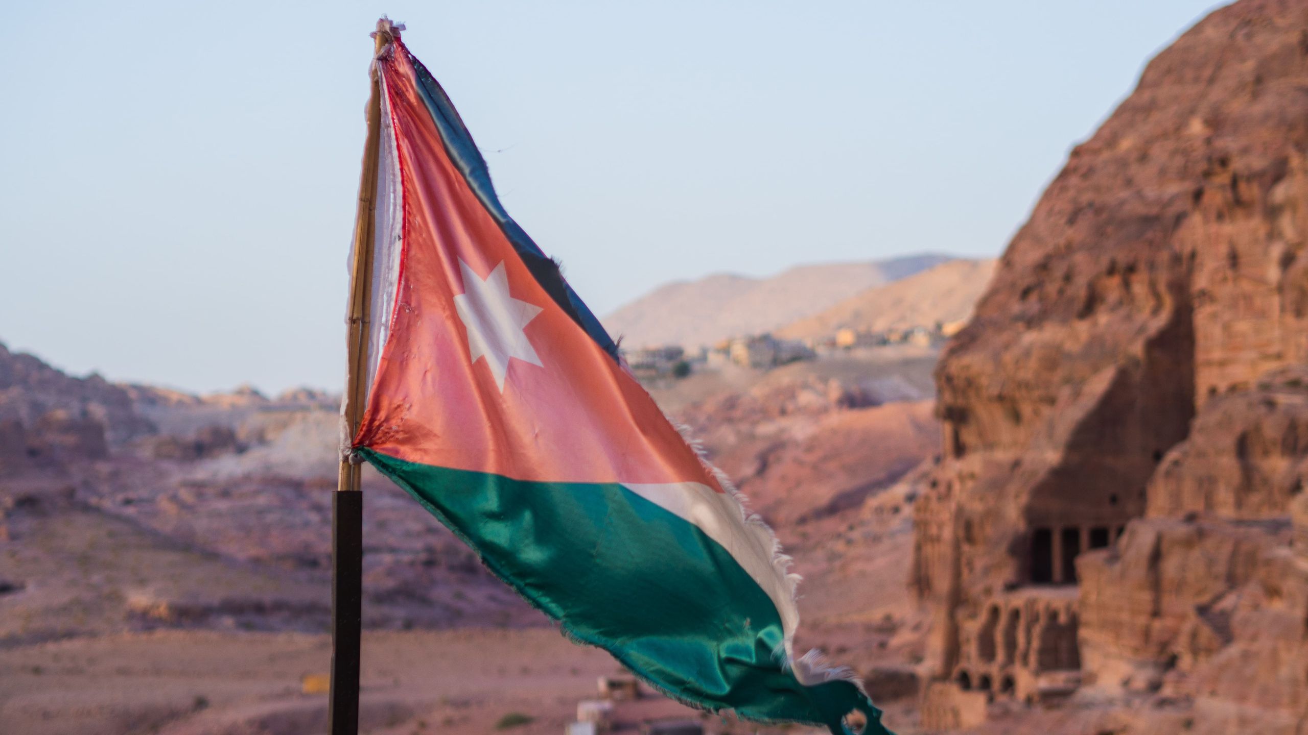 Jordan flag floating over Petra