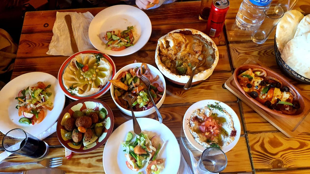 table full of colorful jordanian food