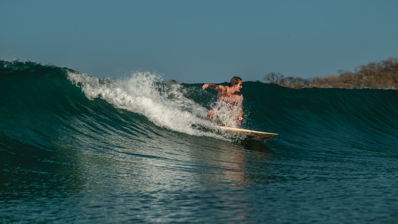 man surfing a wave