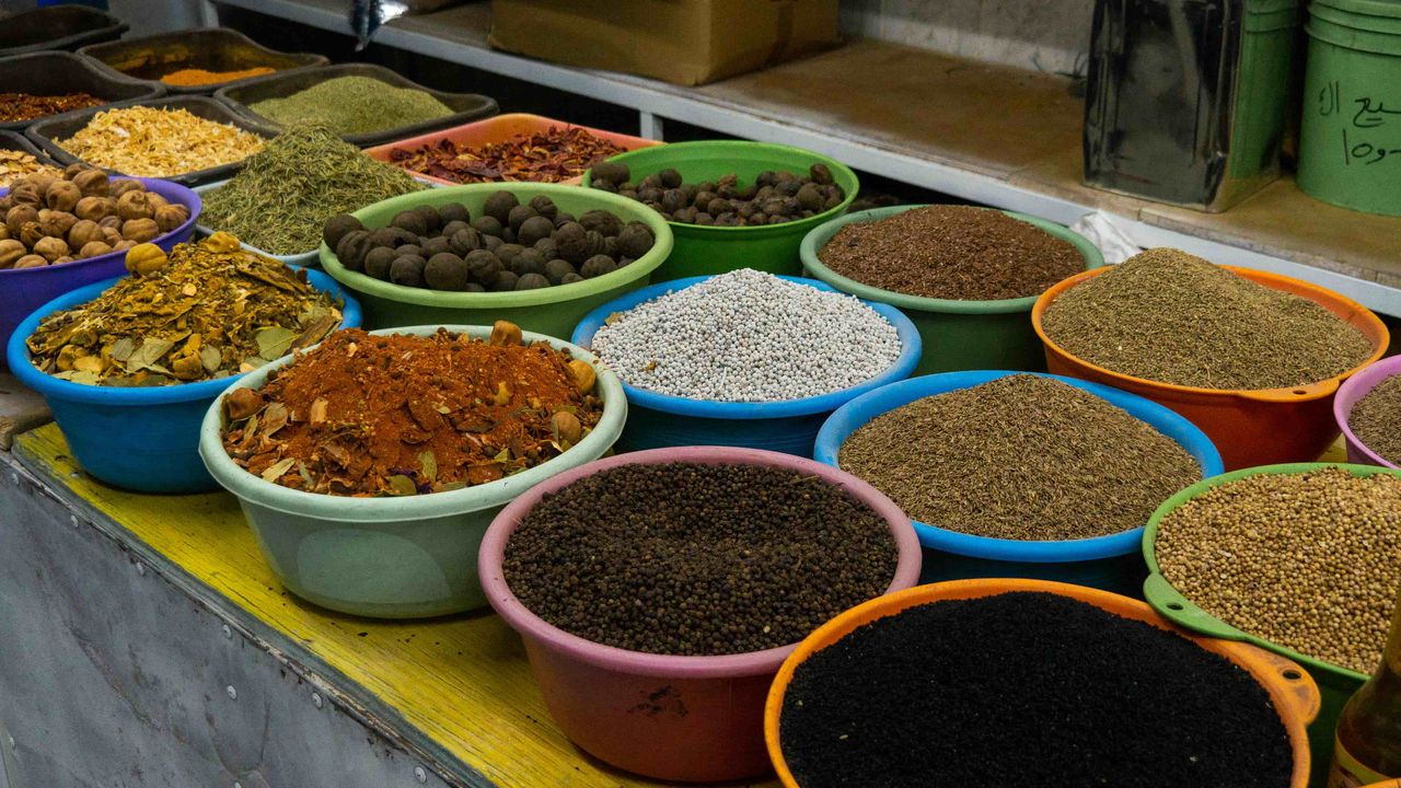 a lot of different spices in pots